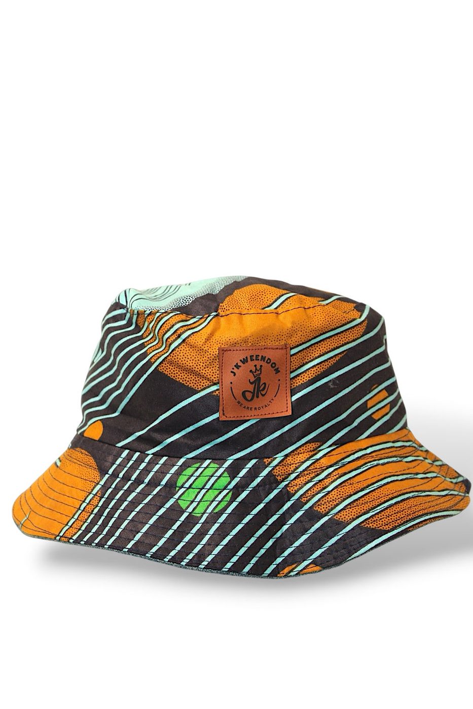 J'Kweendom bucket hat in African print with leather patch